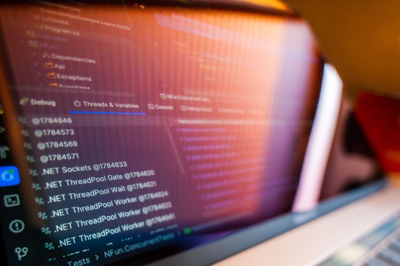 Computer screen displaying code and debugging output