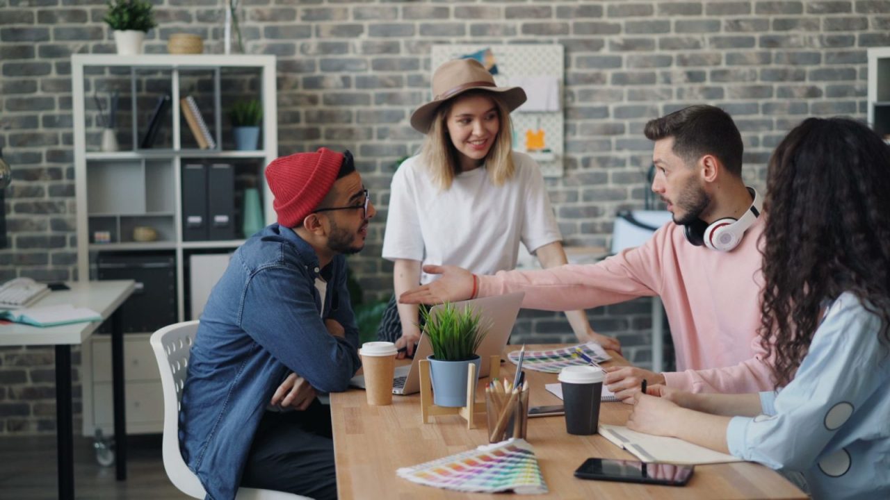 Young professionals brainstorming ideas in a modern office environment